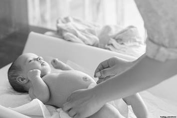image of a baby lying on a changing table