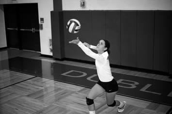 Volleyball player serving